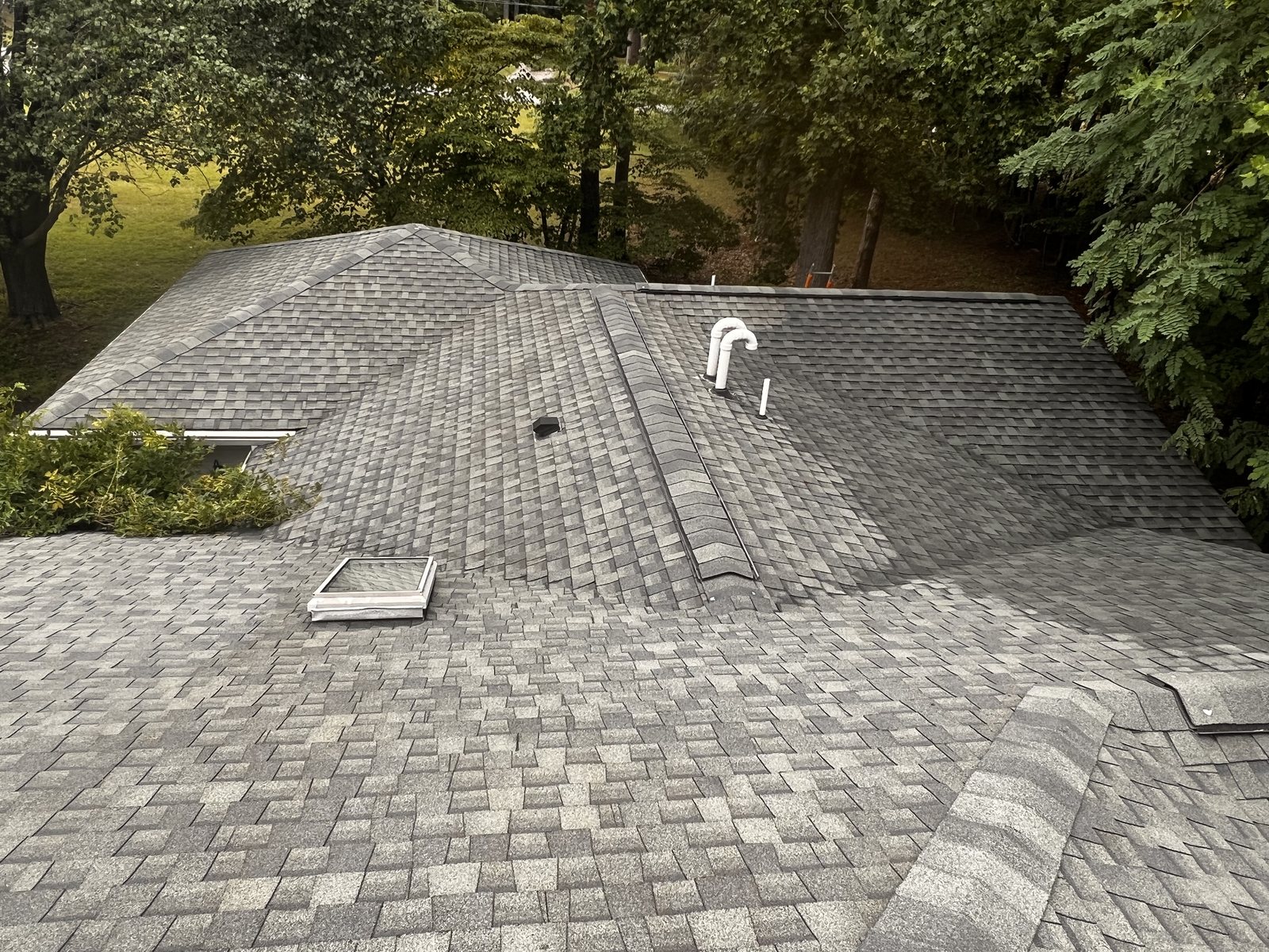 The same roof after soft washing in Union Hall, VA, with moss and black streaking removed and the shingle color even