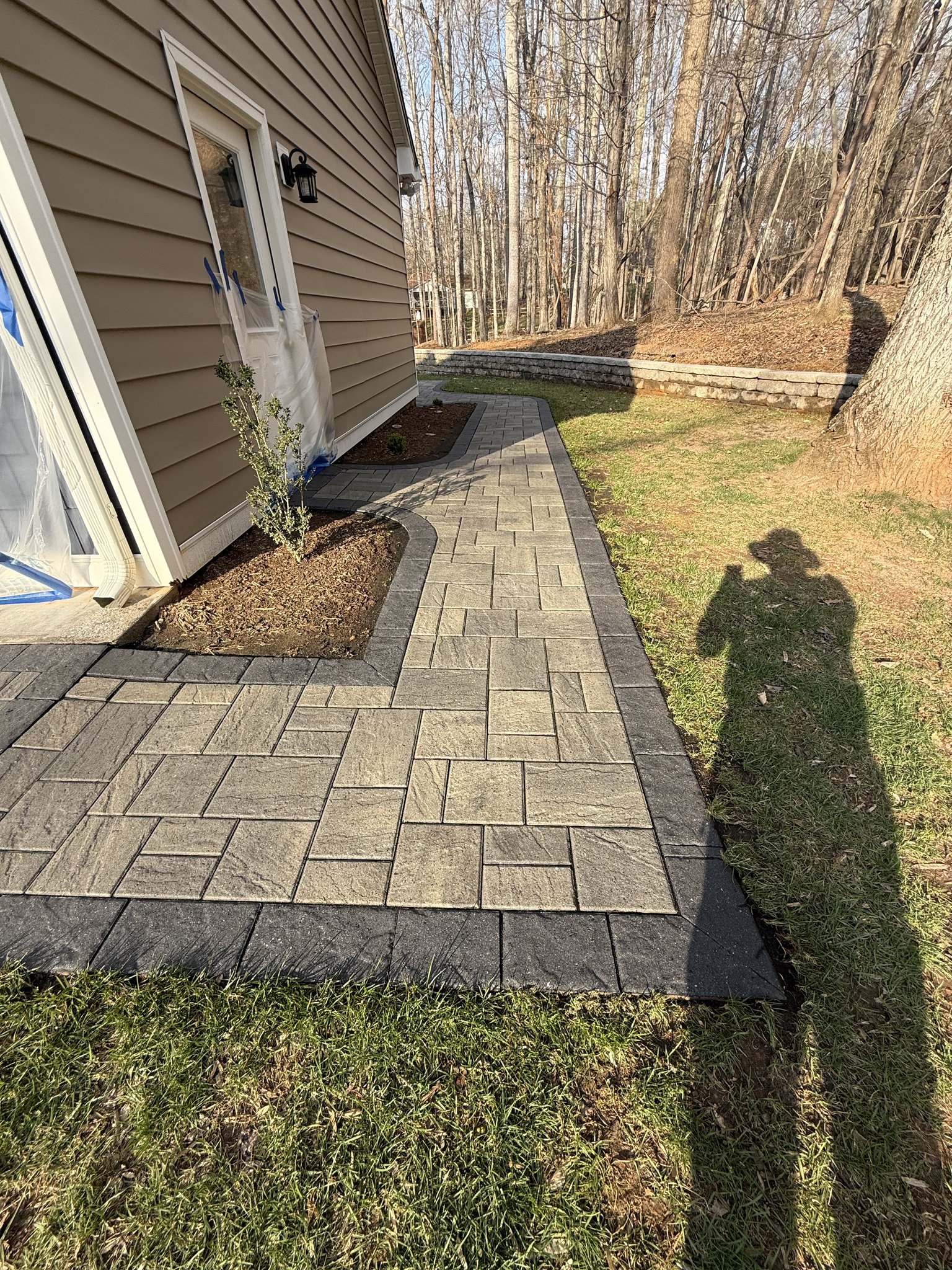 Sealed side paver path with charcoal borders in Huddleston, VA