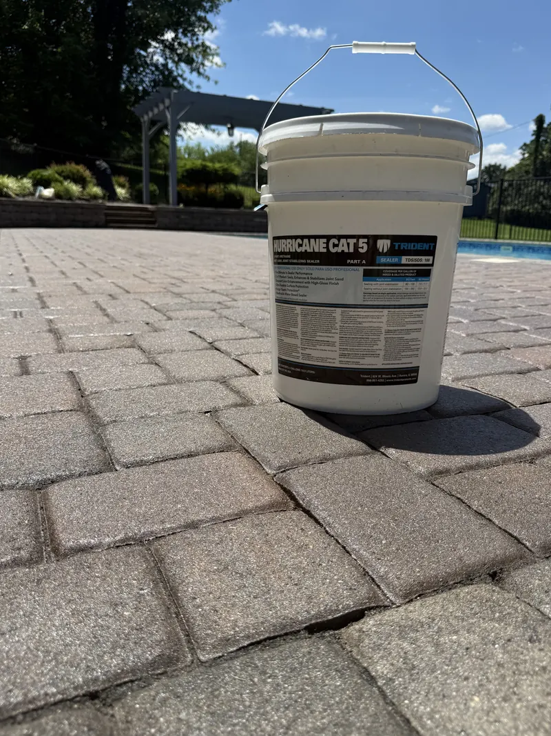 Trident Hurricane Cat 5 two-part urethane paver sealer on the jobsite in Rocky Mount, VA