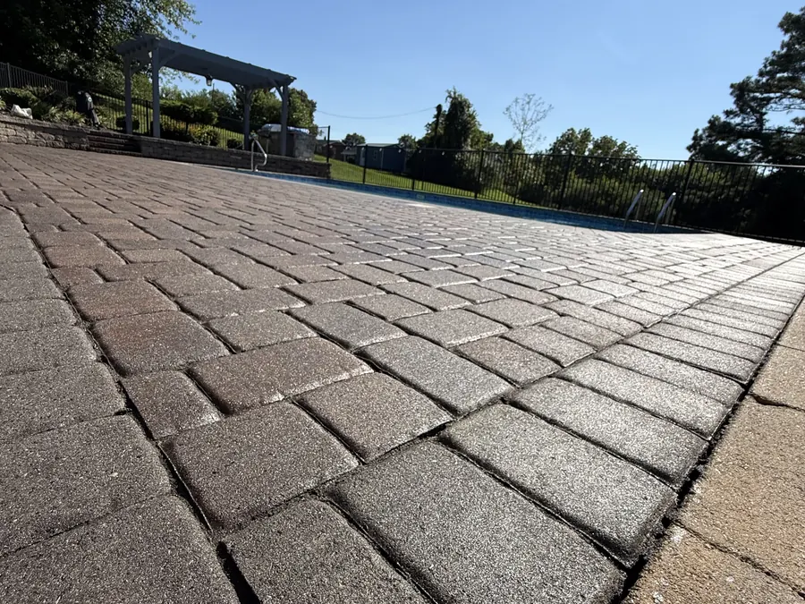Low angle view of a sealed paver pool deck in Rocky Mount, VA
