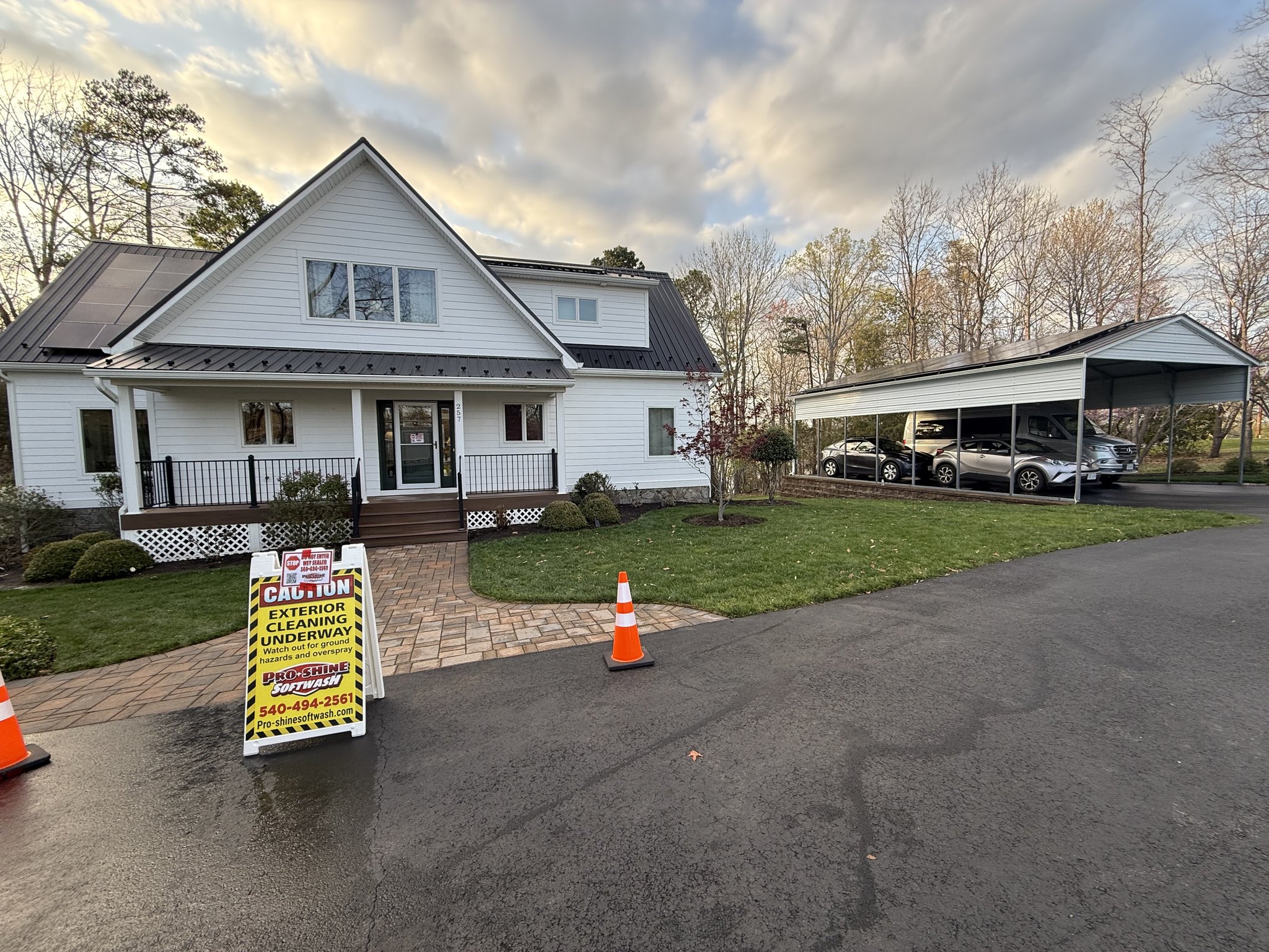 Pro-Shine Softwash jobsite with caution signage during paver restoration in Union Hall, VA