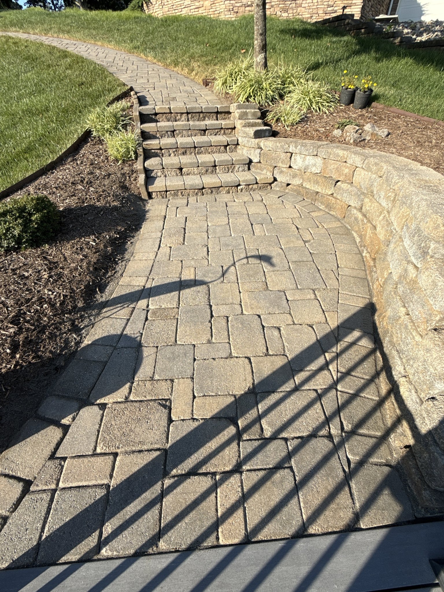 Cleaned and sealed pavers at the base of the block steps in Huddleston, VA