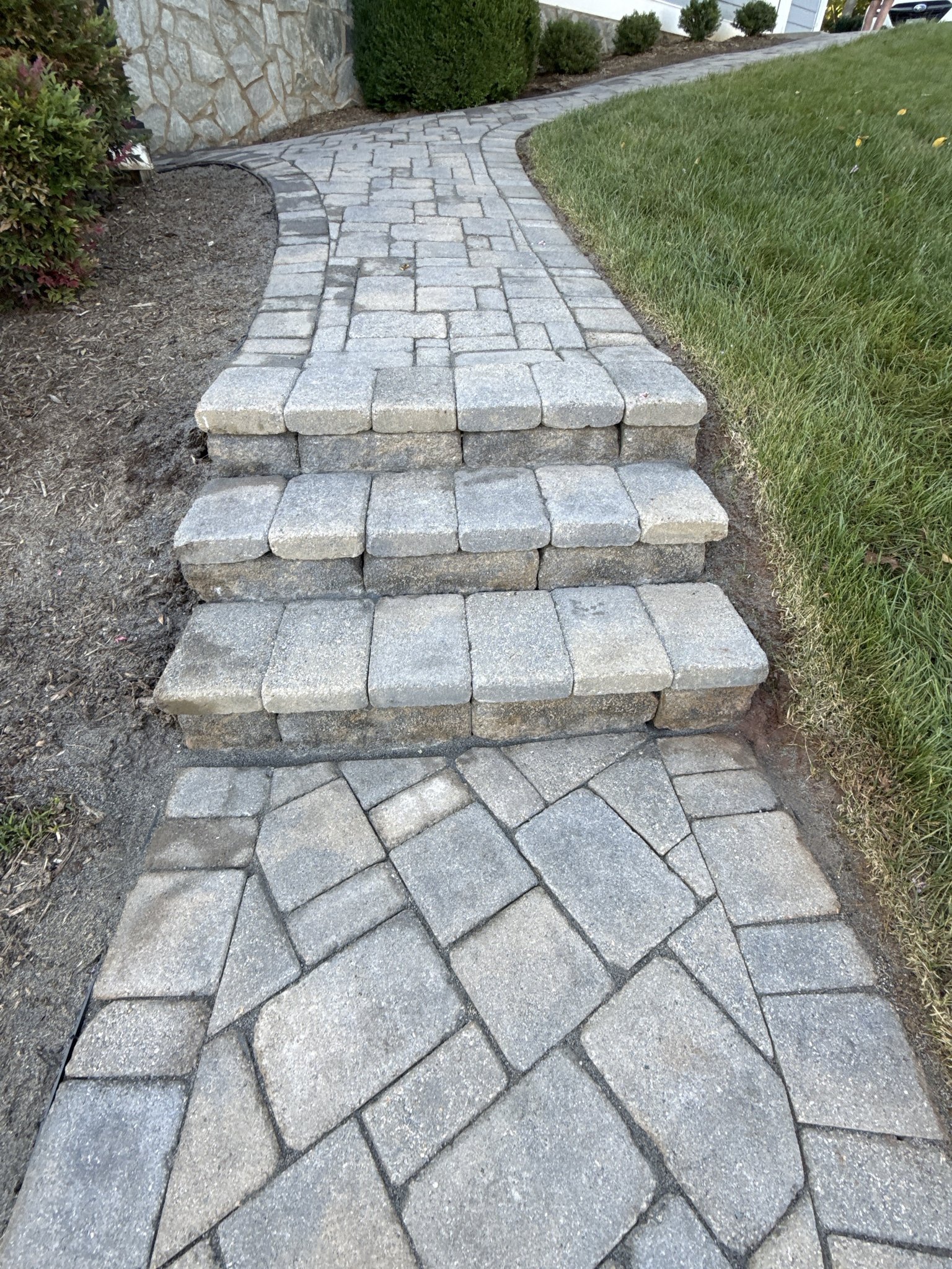 Restored paver steps and walkway after cleaning, new joint sand, and sealing in Huddleston, VA