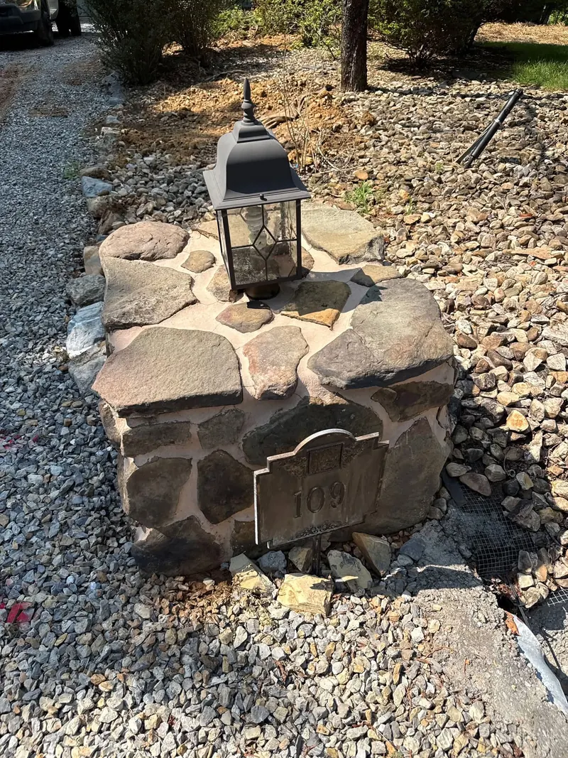 Cleaned stone entry column and lantern at a Smith Mountain Lake, VA property