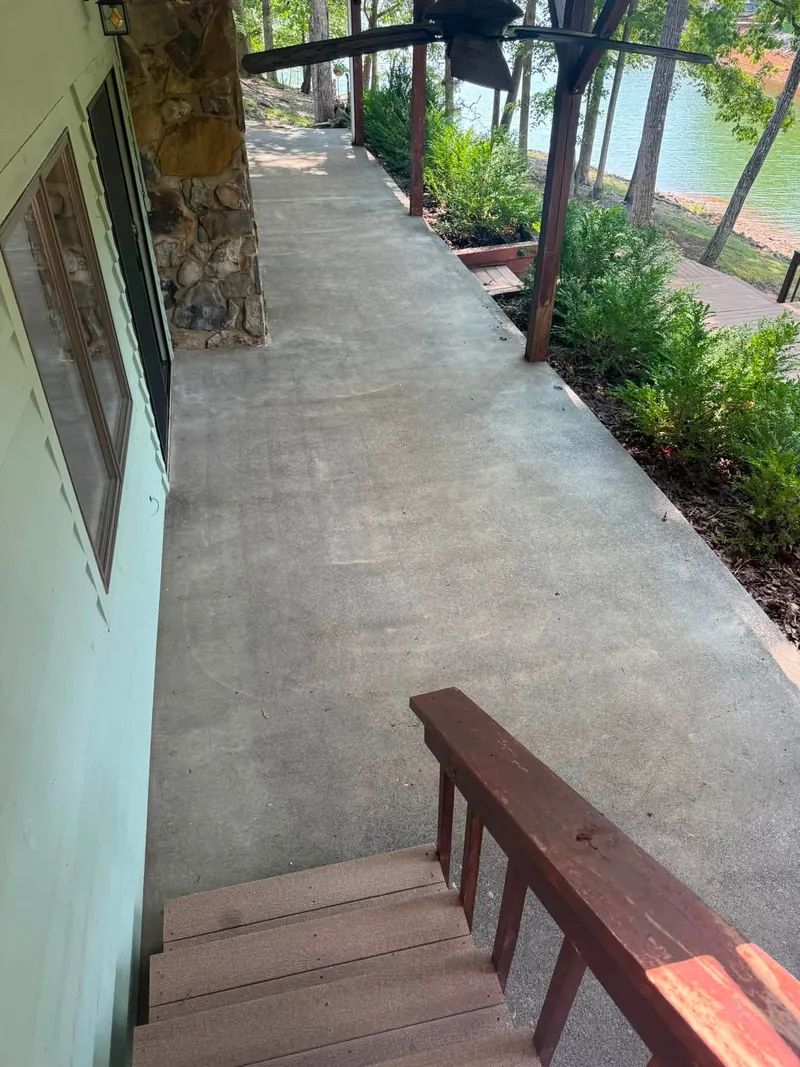 Cleaned covered concrete walkway beside a lake house in Smith Mountain Lake, VA