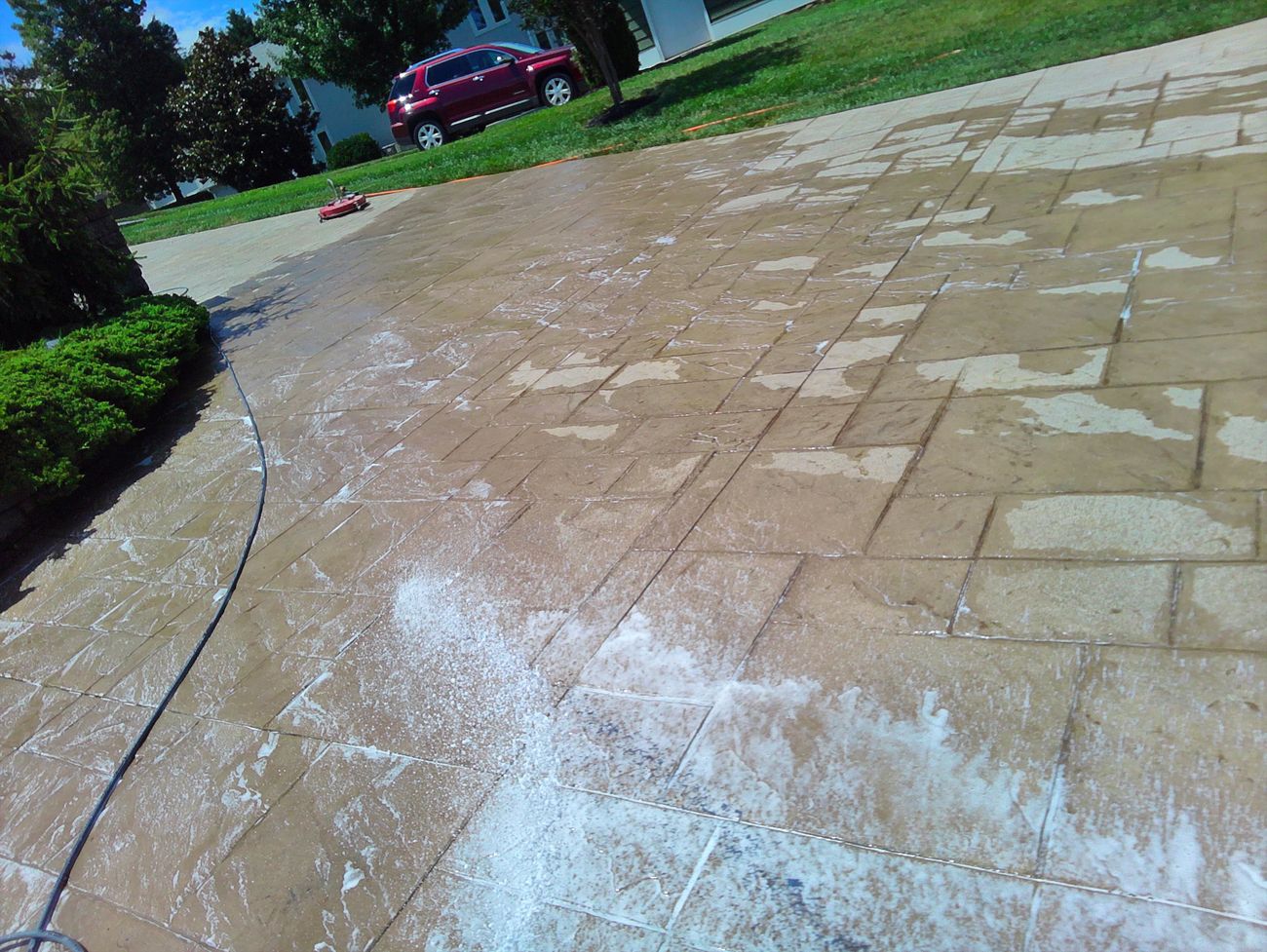 Deep cleaning solution working on stamped concrete surface