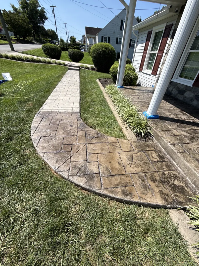 Stamped concrete walkway partway through sealing in Rocky Mount, VA